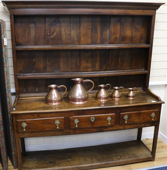 A late 18th century oak dresser and rack, W.167cm H.186cm